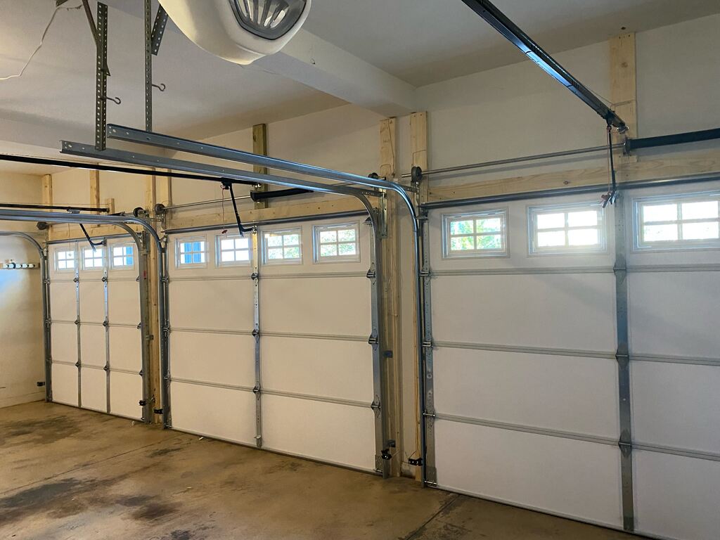 Keeping Garage Door Tracks Straight and Smooth in Molena