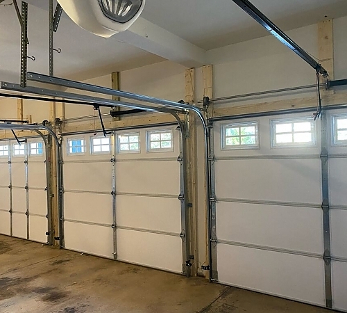 Indoor view of series of garage doors 